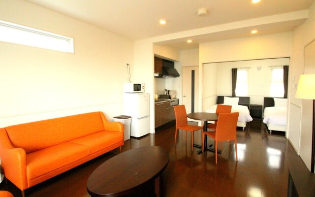 Resort Class Inn Onna