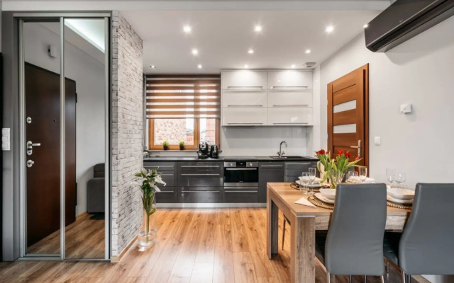 Modern and Industrial Apartment in Historic Brewery by the Old Town
