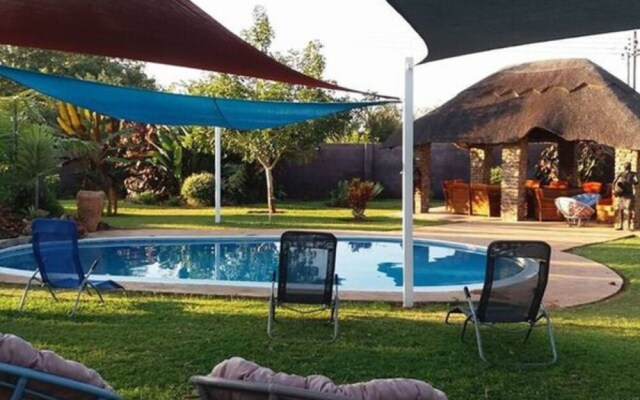 "room in Lodge - Zambezi Family Lodge - Rhino Room"