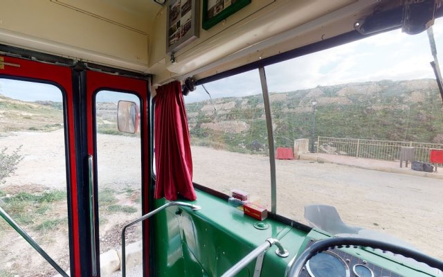 Gozo Bus Glamping - Stay on a 1974 Vintage Maltese bus in Xlendi