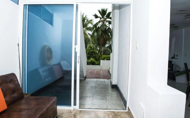 Apartamento con playa privada y piscina