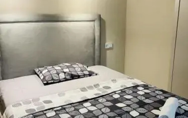 Esil Plaza Apartments c видом на Ботанический сад