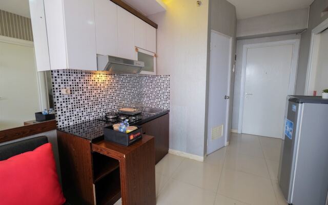 Homey and Relaxing 2BR Green Pramuka Apartment