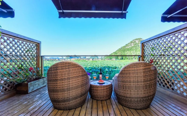 Puzhehei Xiyard Resort Hotel