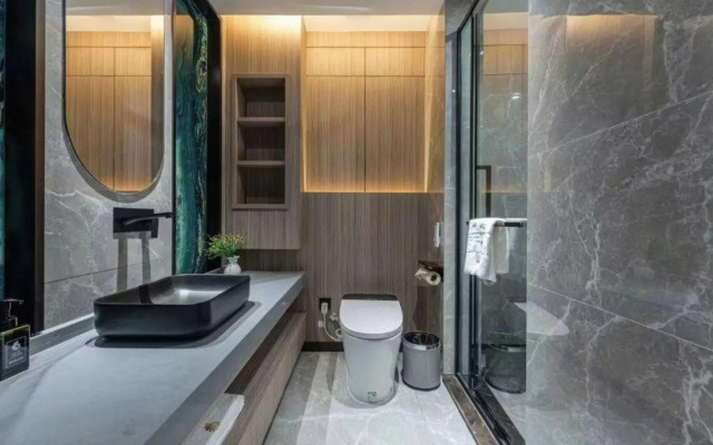 Taizhou Meizhu Hotel (Jiaojiang City Government Avenue Baolongcheng Store)