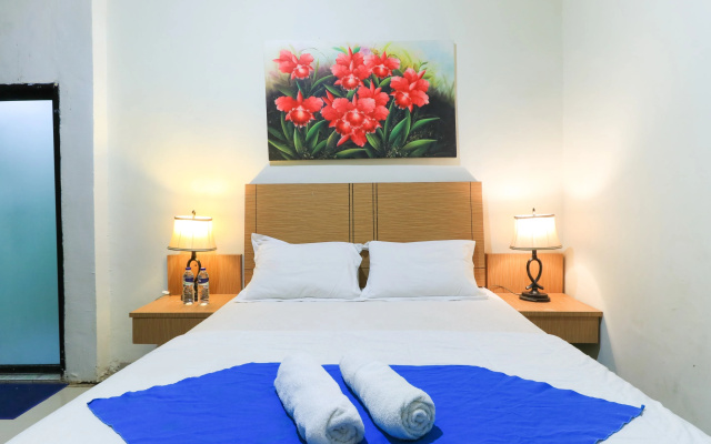 Labuana Homestay & Cafe Garden by ZUZU – Guest Rooms – Makassar