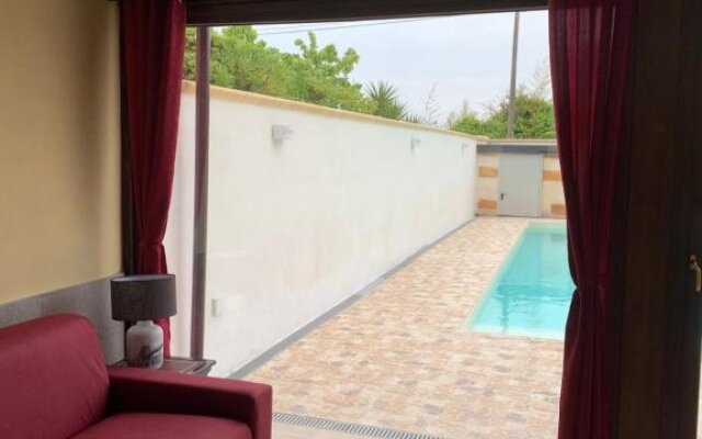 Appartamento in villa con piscina a 700m dal mare