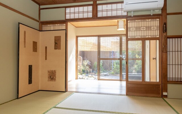 Jyuraku Tomi
