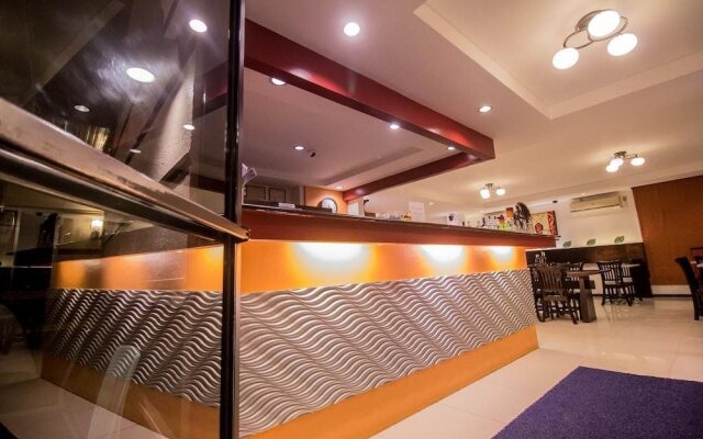 The Red Palm Suites and Restaurant