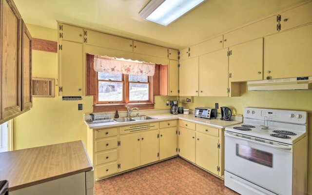 Quaint Creekside Home w/ Spacious Deck & Yard