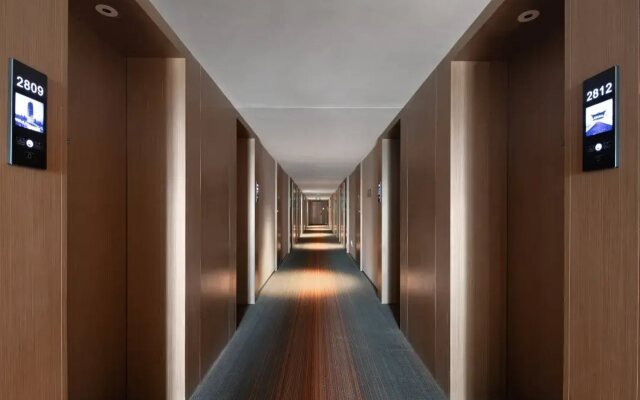 Hampton by Hilton Zhumadian Sports Center