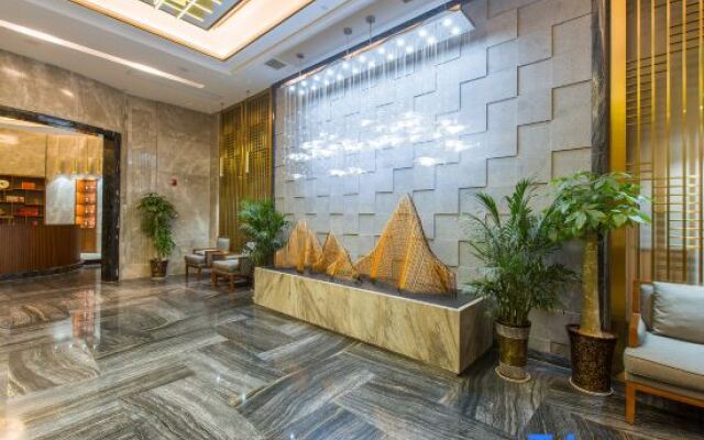 Huada Light Luxury Hotel