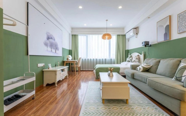 Caomu Nianhua Apartment (Binjiang Branch)