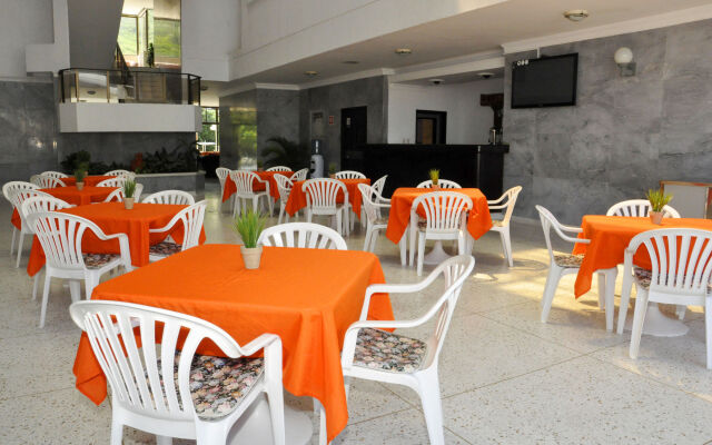 Axis Inn by GEH Suites Hotel
