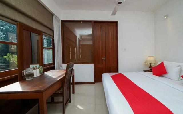 OYO 557 De Mansion