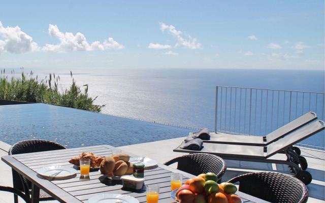 Modern cliff-top villa, panoramic sea-views, A/C, heated pool | Cliffscape