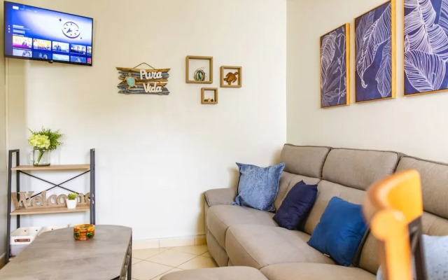 Cozy Condo with Panoramic Hillside Views from Rooftop Terrace and Short Walk to Beach