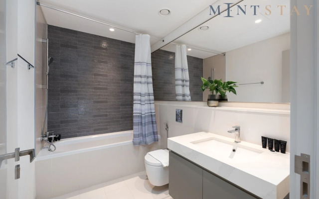 Elegant 2BR Emaar Beachfront Retreat