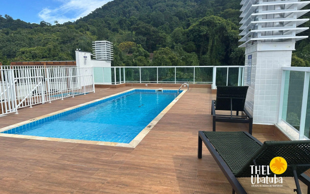 Apto completo e confortável com roupa de cama nas Toninhas  Condomínio Lumière