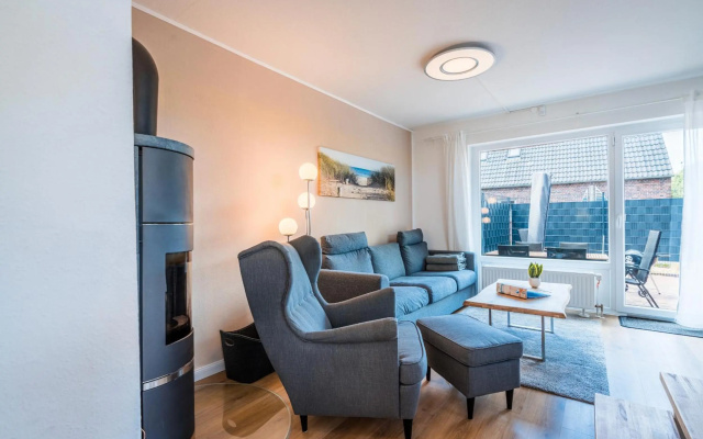 Ferienhaus Steuerbord mit Kamin, Terrasse und Boot
