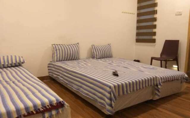 Nestlay Rooms Vanagaram