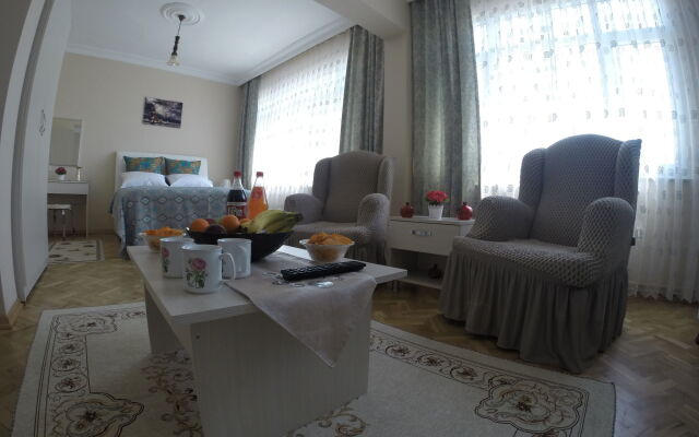 Atam Hotel & Suites