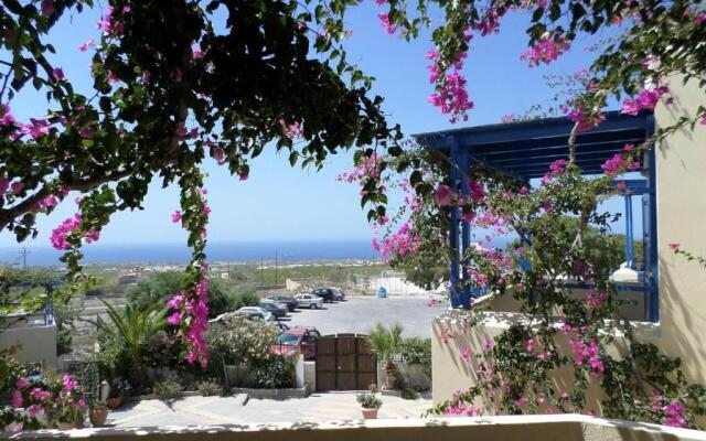 Santorious Flower Covered Apartment