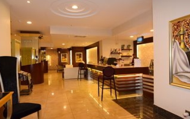 Capital O 596 Garden Palace Hotel