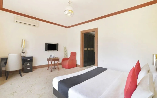 Capital O 29124 Royal Palms Hotel