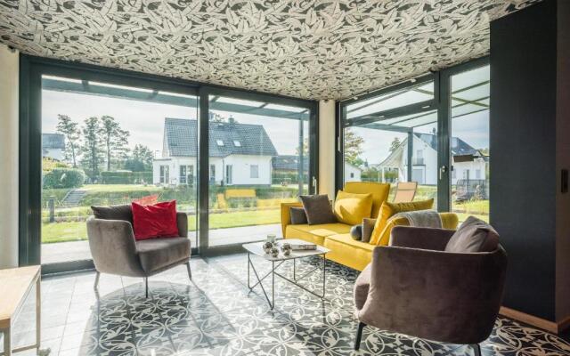 Luxus FeWo 122 m² direkt am Wasser mit Boot