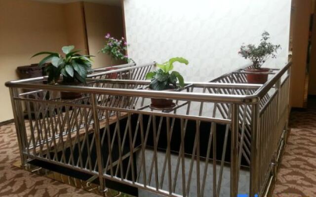 Xinmeijia Business Hotel (Huatian Town)