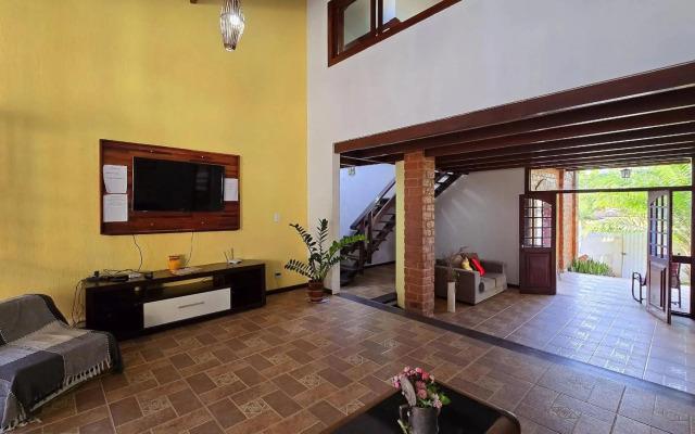 Casa Toscana 4 suítes, piscina e churrasqueira