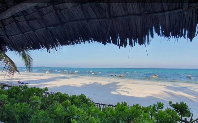 "room in Guest Room - Romantic Room With Access to Beach Ideal for 2 Guests, in Kigomani, Zanzibar"