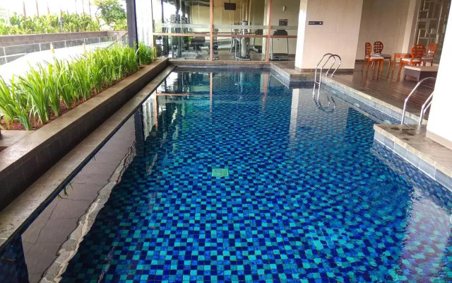 Elegant 1BR Kemang Village Apartment By Travelio