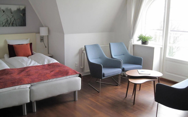 Sixtus Sinatur Hotel og Konference