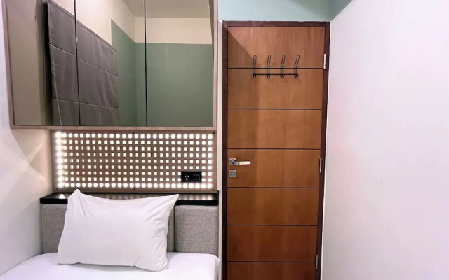 Warm And Homey 2Br At Vida View Makassar Apartment