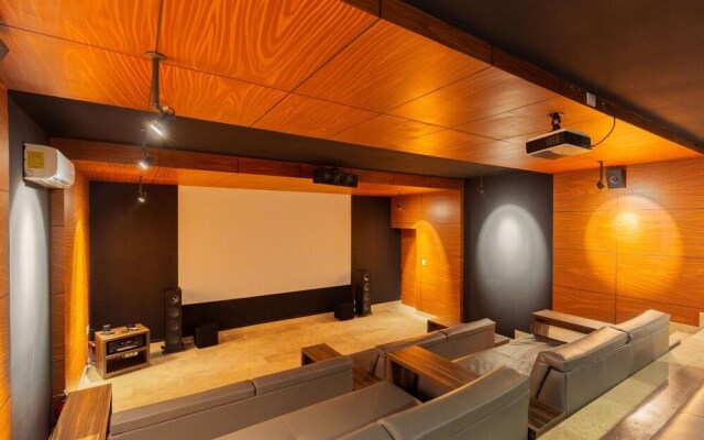 Spacious 2 BR Aldea Zama Private Pool Movie Cinema Gym
