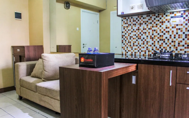 Comfortable and Tranquil 2BR Apartment at Green Pramuka By Travelio