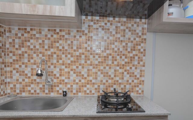 Comfy and Minimalist Studio at Amethyst Apartment