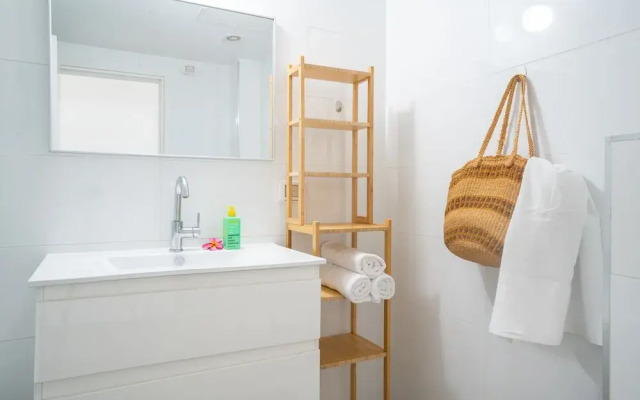 Vibrant Seaside Stay with Balcony by Sea N' Rent