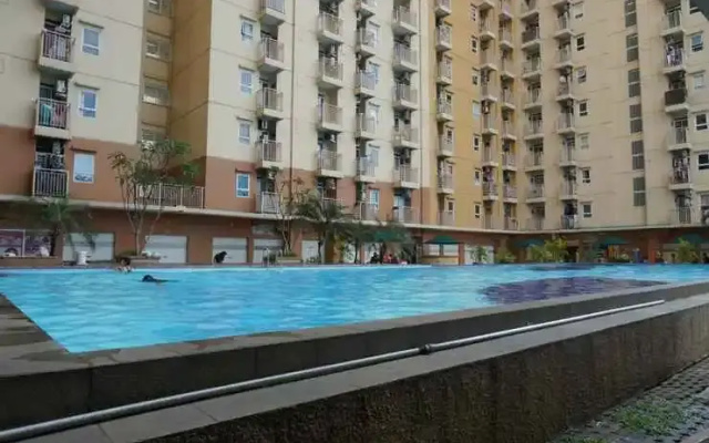 Comfy 3BR Apartment at Green Palm Residences By Travelio