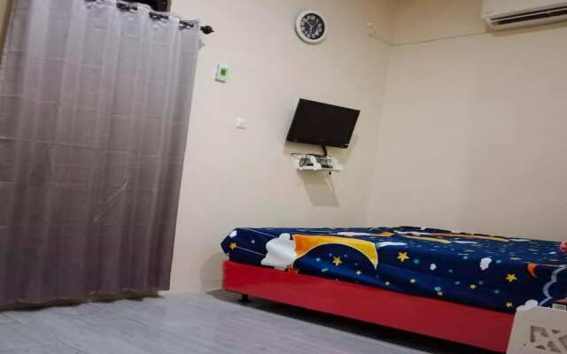 OYO 93741 Ayna Kost Syariah