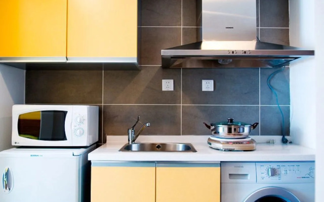 Dalian Yike Yijia Serviced Aparthotel