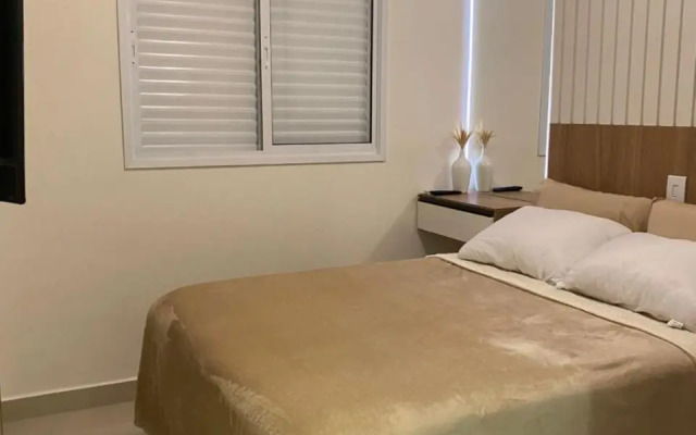 Apartamento em Bertioga com varanda gourmet