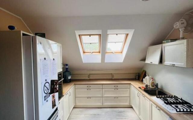 "U Mamy Róży" - Pokoje Gościnne