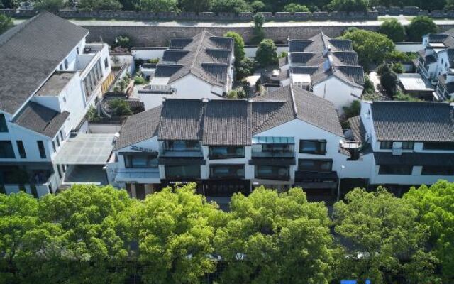 WOPAI Designer Hotel (Suzhou Guanqian Street Yangyuxiang Subway Station Branch)