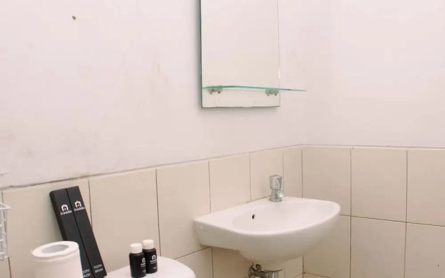 Warm And Simply Studio Room At Azalea Suites Apartment