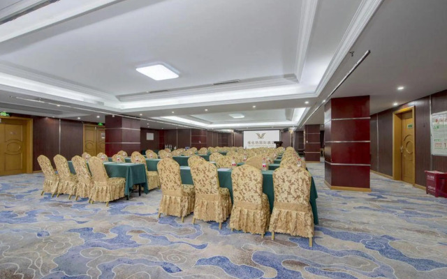Vienna International Hotel Xinyang Yangshan New District Branch