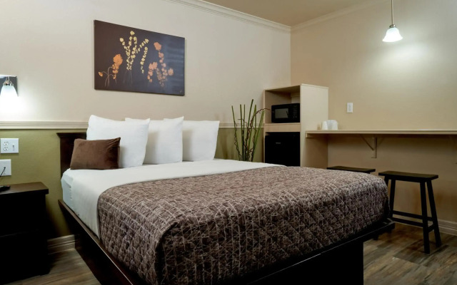 Family Garden Inn & Suites