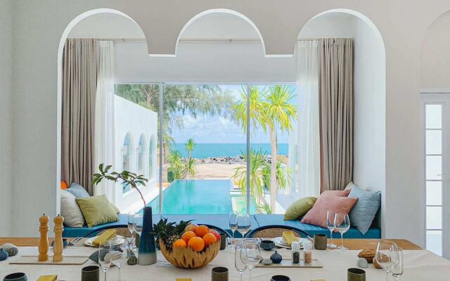 Cape by Sichon Tesoro